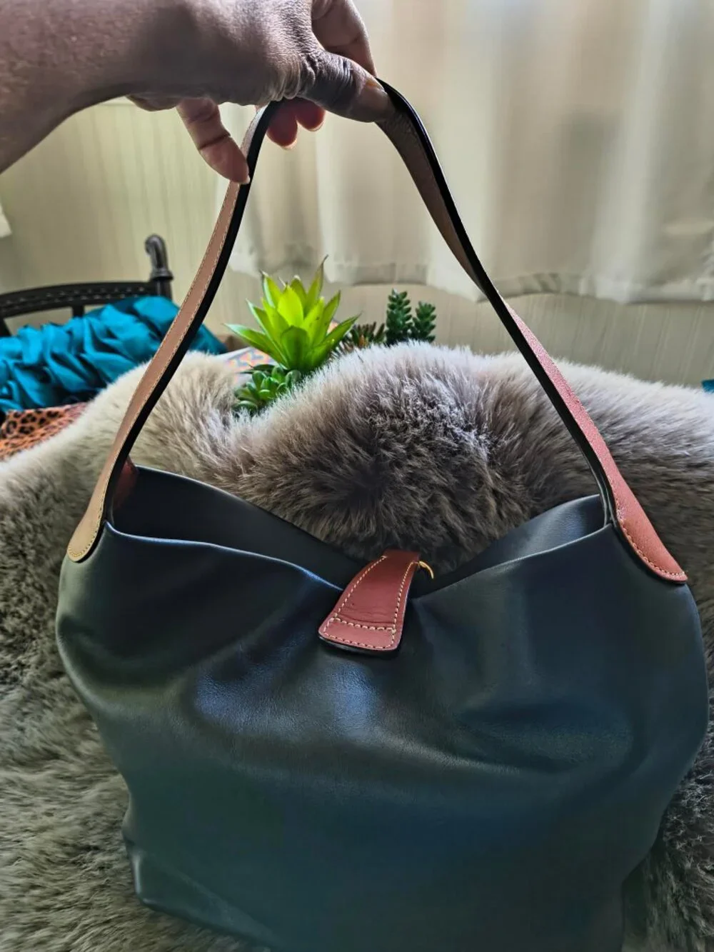 Dooney & Bourke d&b logo